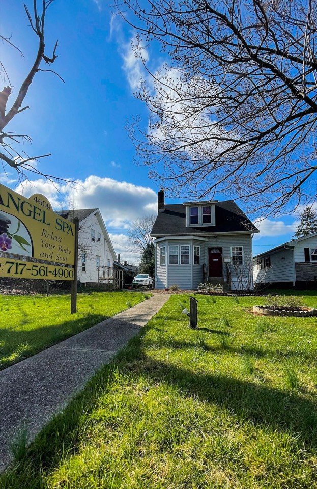 The front of Angel Spa at 4609 Derry Street with the roadside sign